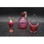 A cranberry glass jug, a posy bowl and a Limoges ewer. H.19cm (3) (jug chipped as photographed).