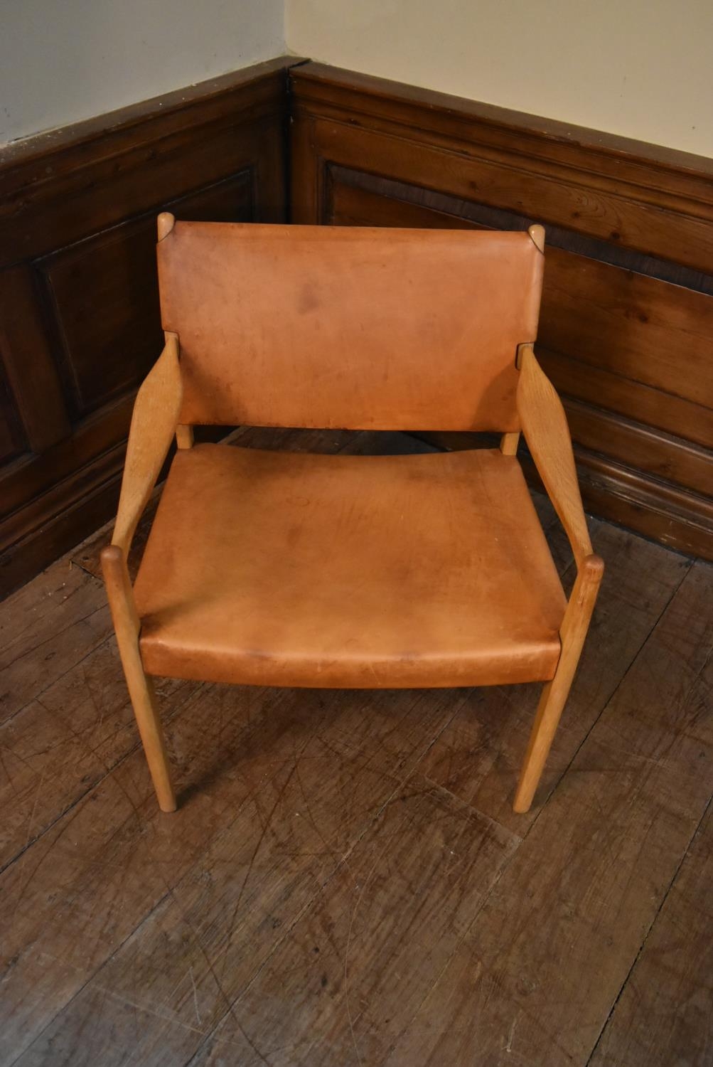 A mid century Scandinavian oak framed armchair with stretched light tan leather seat and back. H. - Image 3 of 6