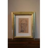 A gilt framed and glazed charcoal sketch, male portrait, monogrammed and dated. H.32 W.26cm