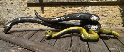 A large painted fibre glass figure of a boa constrictor along with a similar figure of another