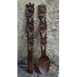 A large decorative carved novelty spoon and fork. H.97cm