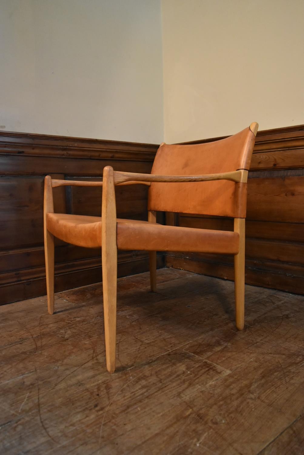 A mid century Scandinavian oak framed armchair with stretched light tan leather seat and back. H. - Image 2 of 6