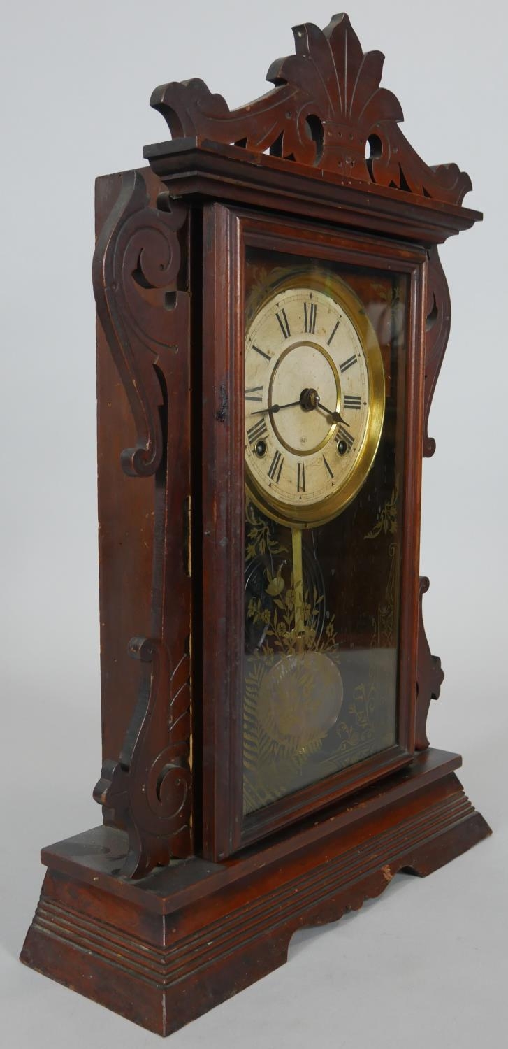 A late 19th century American walnut cased mantel clock with enamel dial and eight day movement by - Image 2 of 7