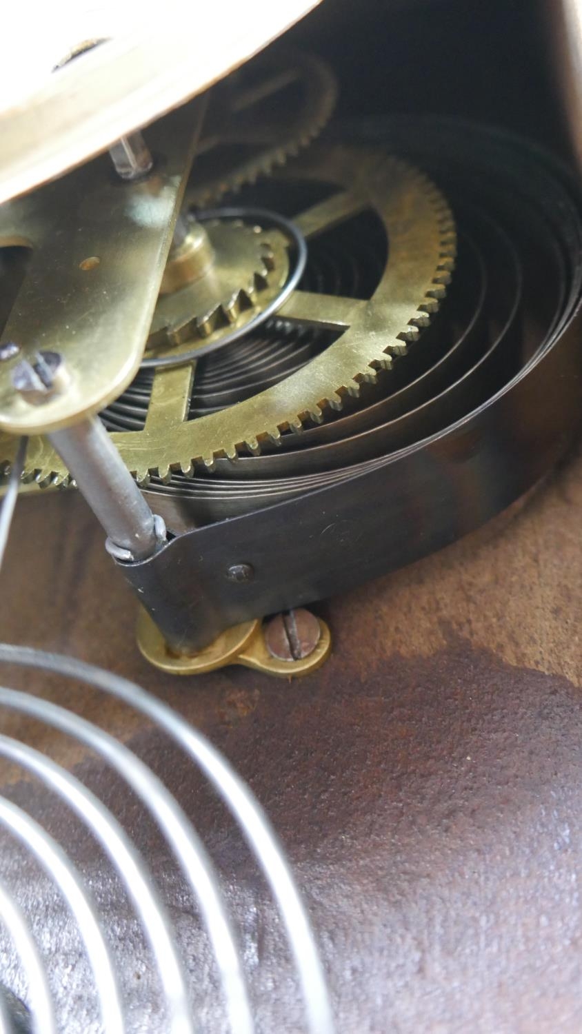 A late 19th century American walnut cased mantel clock with enamel dial and eight day movement by - Image 6 of 7