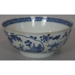 A blue and white 18th century Chinese style porcelain bowl with unglazed foot and oval panels