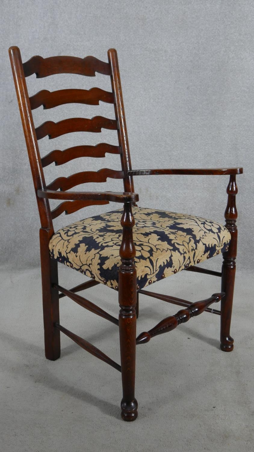 A set of eight oak Lancashire ladderback dining chairs in floral upholstery on turned stretchered - Image 3 of 9