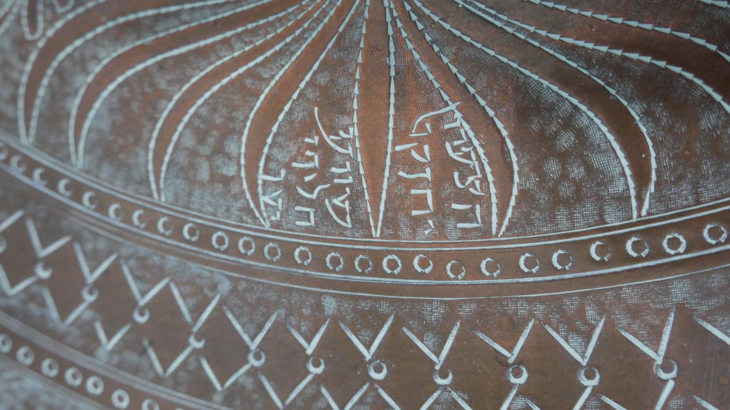 A large brass Eastern engraved tray or table top. D.95cm - Image 2 of 3