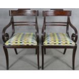 A pair of 19th century mahogany bar back open armchairs with geometric cut moquette drop in seats on