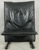 An Arflex T line leather upholstered armchair. H.100cm