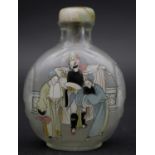 A Chinese reverse painted snuff bottle with jade and ivory stopper. Painted with a theatre scene