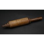 An antique Torah vellum Hebrew scroll on a turned boxwood spindle. L.30cm