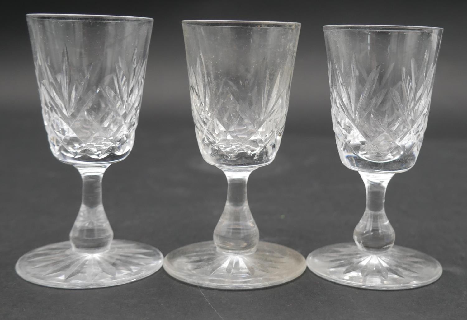 A collection of fifteen cut crystal glasses, including a set of four floral design brandy glasses, - Image 3 of 5