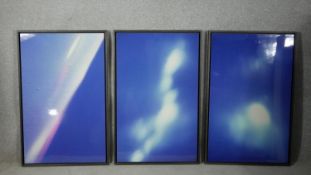 A set of three photographic prints on framed metal sheets. W.51 H.79cm
