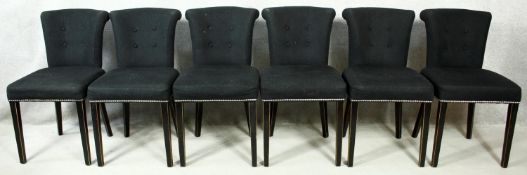 A set of six Eichholtz Largo dining chairs in studded cashmere upholstery. H.86cm