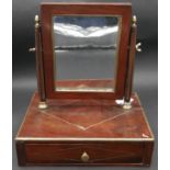 A 19th century French Empire style mahogany swing toilet mirror with brass inlay and fitted with