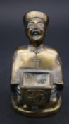 A Chinese brass figure of an official as an incense burner, in robe with hat and long plait,