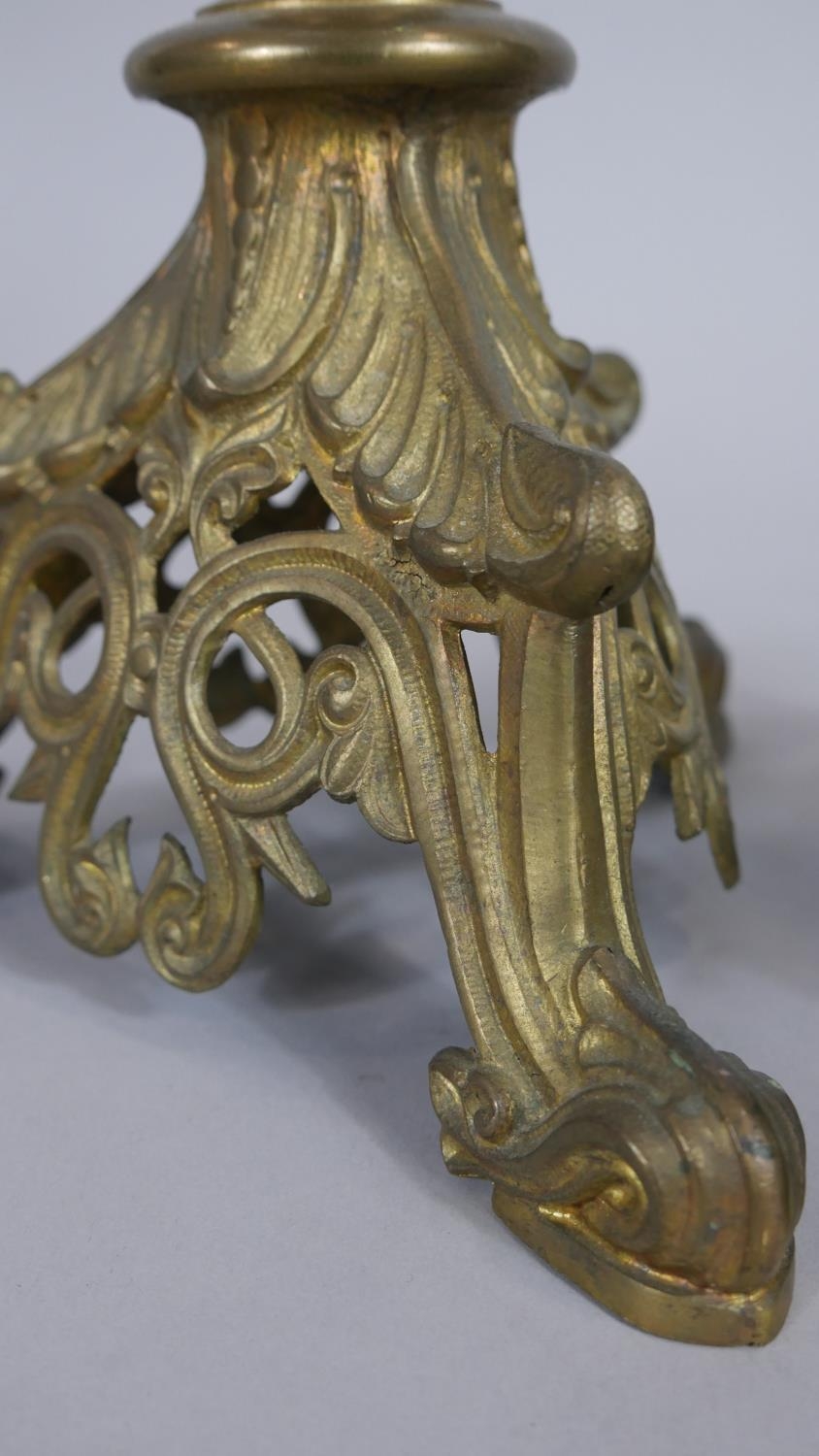 A pair of brass Ecclesiastic style pricket candlesticks on pierced and scrolling tripod bases. H. - Image 2 of 5