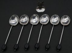 A set of six silver spoons with coffee bean handles, hallmarked Birmingham 1932 along with a