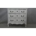 A painted French Provincial style chest of drawers on carved cabriole supports. H.84 W.90 D.43cm