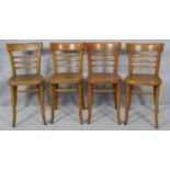 A set of four mid century beech bentwood cafe style chairs. H.78cm