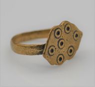 A roman style evil eye bronze ring, an ellipse shape plaque with ring marking on a court shape band.