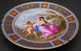 A 19th century porcelain plate hand decorated with scenes from Venus and Amor, Royal Vienna mark