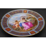 A 19th century porcelain plate hand decorated with scenes from Venus and Amor, Royal Vienna mark