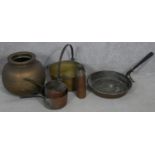 A 19th century brass swing handled jam pan and a miscellaneous collection of copper and brass pans