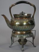 A C.1900 Benetfink and Co silver plated spirit kettle on stand with burner and engraved monogram and