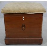 A 19th century mahogany and inlaid cellarette with twin carrying handles and upholstered top. H.50