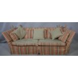 A Knole sofa bed in candy stripe upholstery with 4'6" mattress. (Originally bought from Liberty).