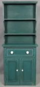 A painted narrow dresser with open plate rack above base fitted with cupboards and a drawer. H.181