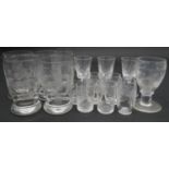 A collection of fifteen cut crystal glasses, including a set of four floral design brandy glasses,