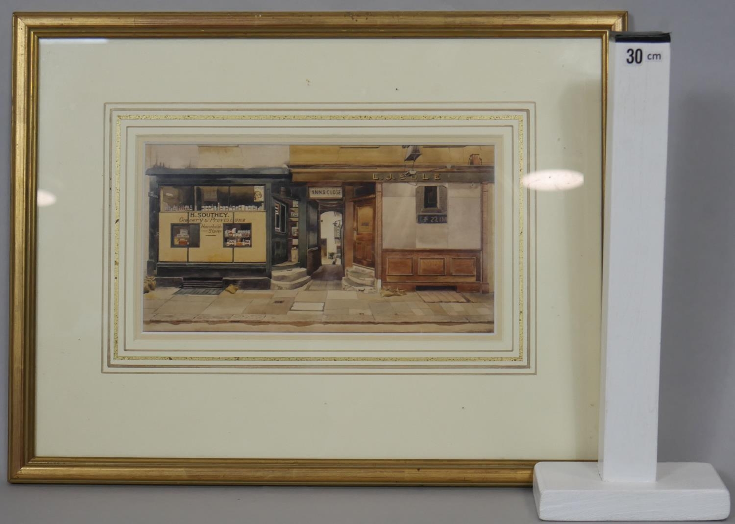 Phyllis Dimond- A framed and glazed print of a shop front, printed signature. H.32 W.41.5cm - Image 6 of 6