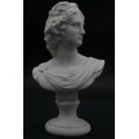 A reconstituted marble bust of Apollo. H.25cm