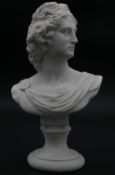 A reconstituted marble bust of Apollo. H.25cm