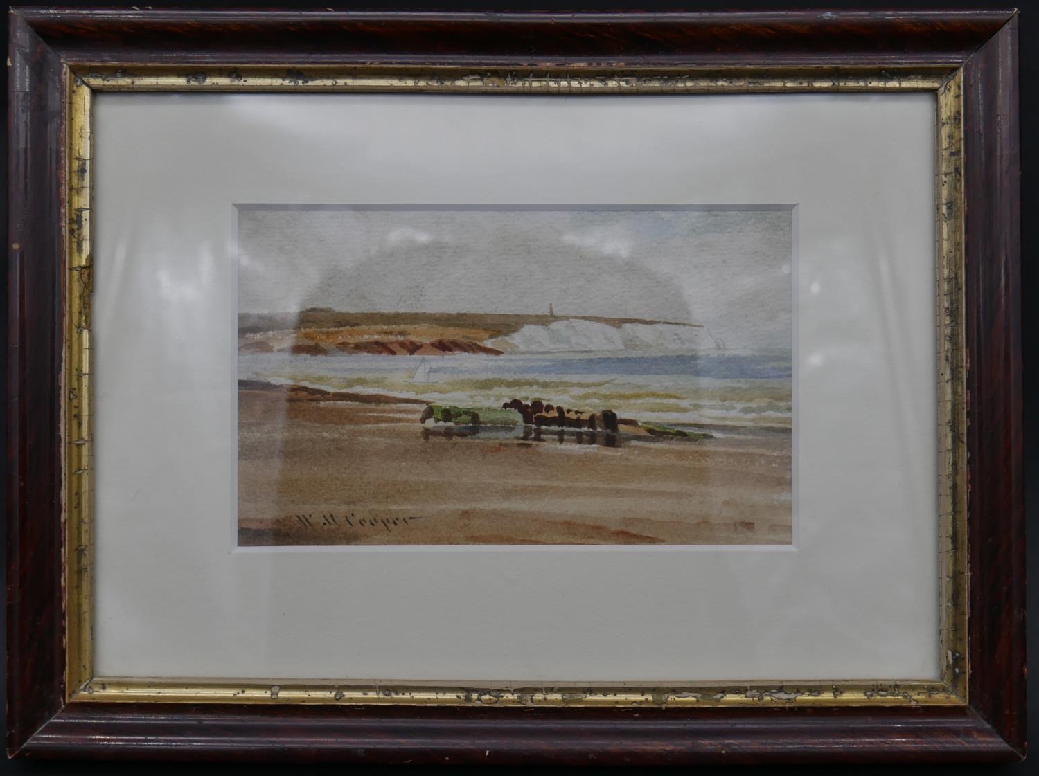 A glazed and framed watercolour, beach with chalk cliffs in the distance, signed Cooper. H.21 W.28cm - Image 2 of 5