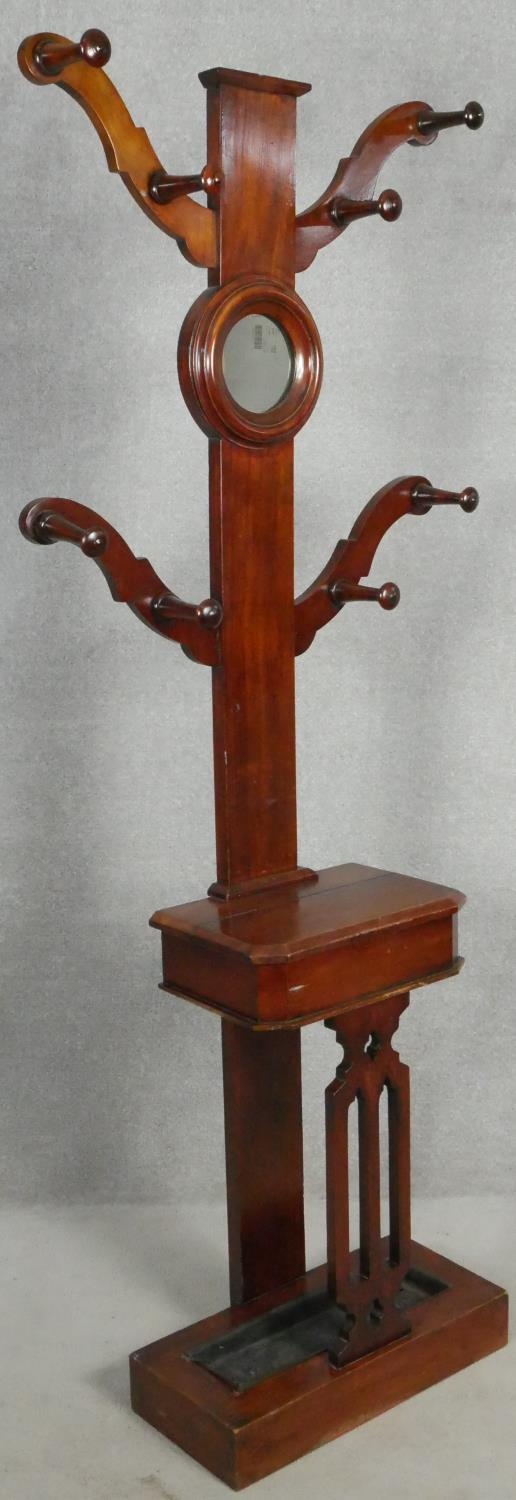 A Victorian mahogany hallstand with turned coat hooks on swept branches fitted with vanity mirror - Image 2 of 4