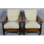 A pair of mid century oak framed armchairs with sliding reclining action newly upholstered in cut