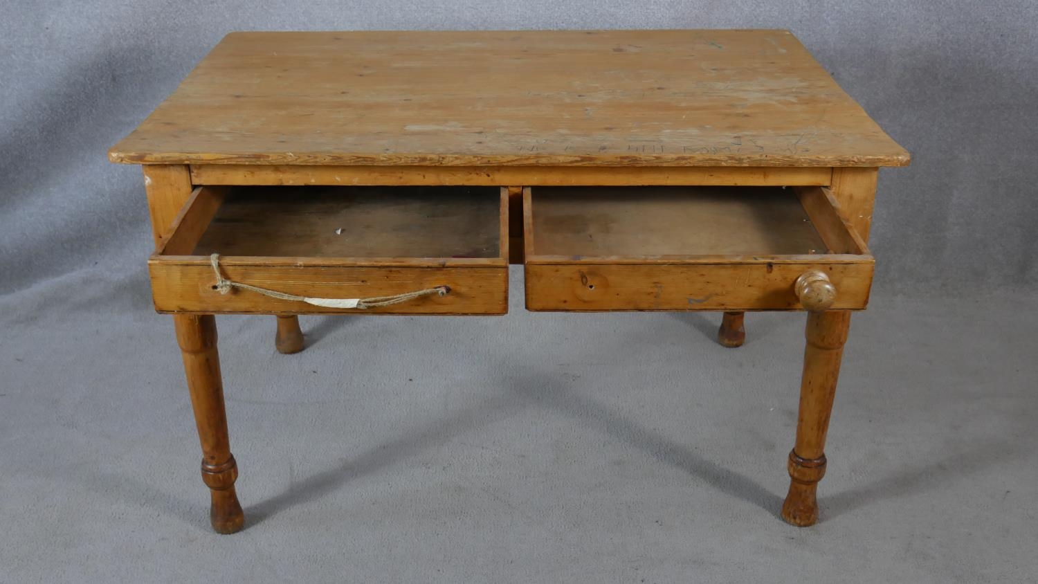 A Victorian pine two drawer side table on turned tapering supports. H.64.5 L.121 W.83cm - Image 2 of 8