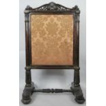A William IV mahogany fire screen with tapestry inset panel. H.107cm