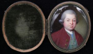 A 19th century shagreen oval cased glazed portrait miniature on ivory of an elderly gentleman in a