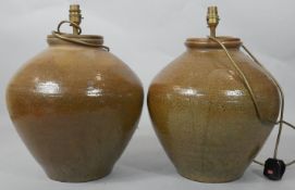 A pair of baluster shaped stoneware table lamps. H.45cm