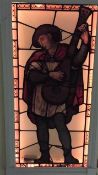 A painted carved frame antique French stained glass panel of a minstrel playing the lute. H.152 W.