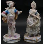 Two C.1900 Meissen style hand painted porcelain figures of a lady and a man in traditional clothing.