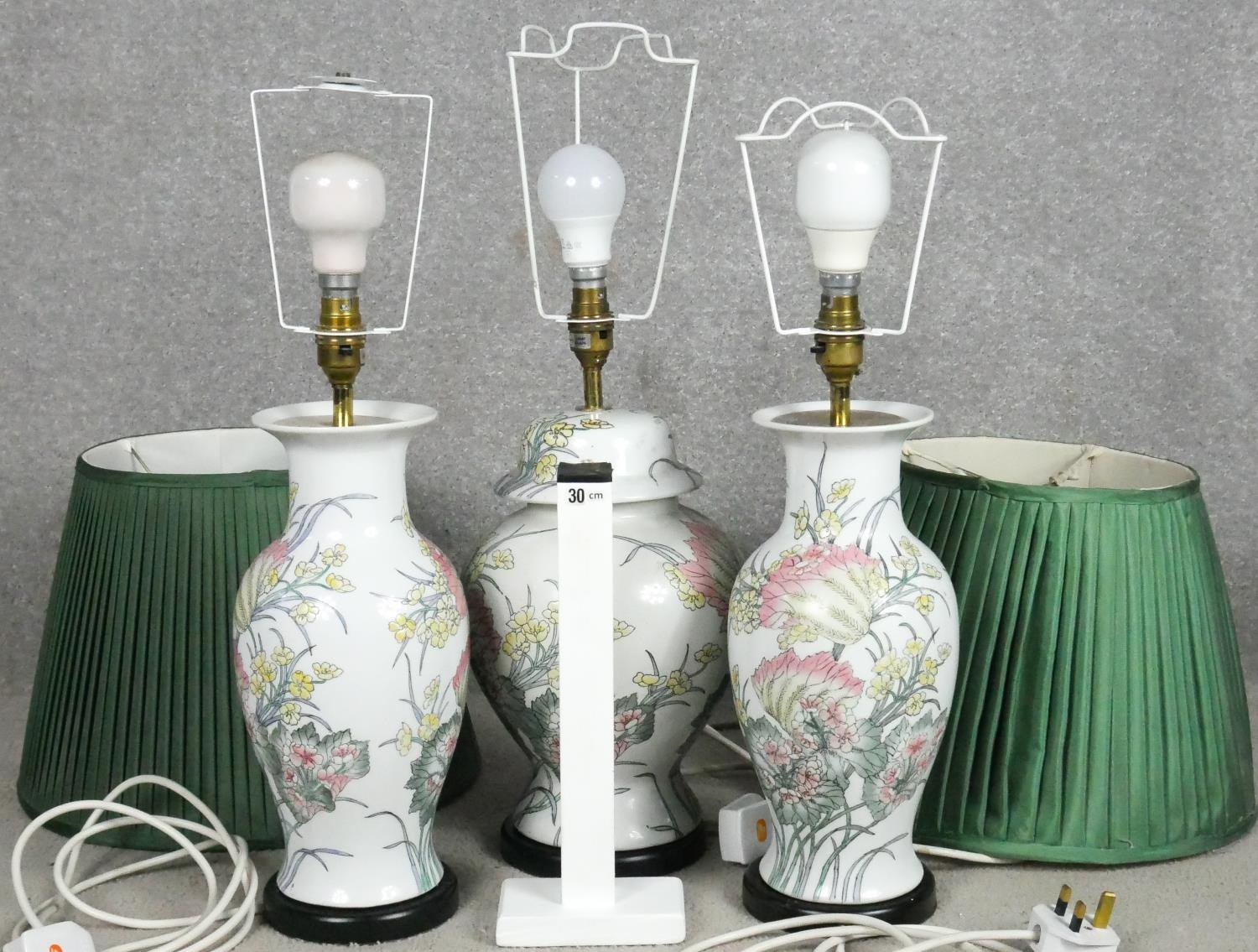 A pair of floral glazed table lamps along with a matching lamp in the form of a temple jar. H.58cm - Image 4 of 4