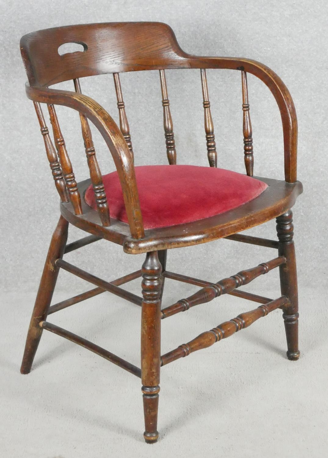 A late 19th century oak captain's desk chair with spindle back on stretchered supports. H.76cm - Image 2 of 5