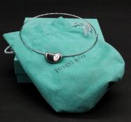 A Tiffany & Co silver Kidney Bean choker necklace by Elsa Peretti. Signed and stamped with makers