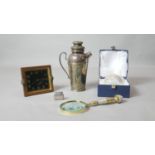 A miscellaneous collection to include a hallmarked silver Colibri lighter, a cased Art Glass vase, a