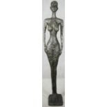 A bronze figure in the manner of Giacometti's Standing Woman. H.166cm